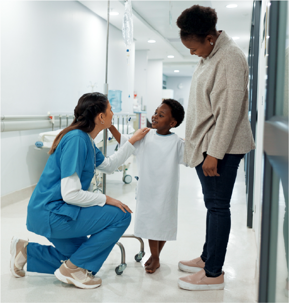Nurse and little boy patient with his mom